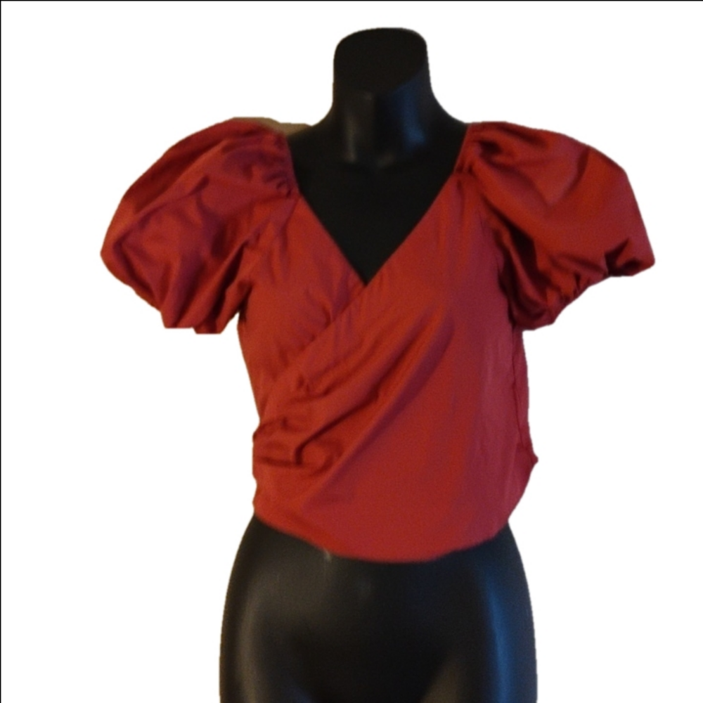 Asos size 6 tie shirt.Light rust color. Great with the high waisted jeans .